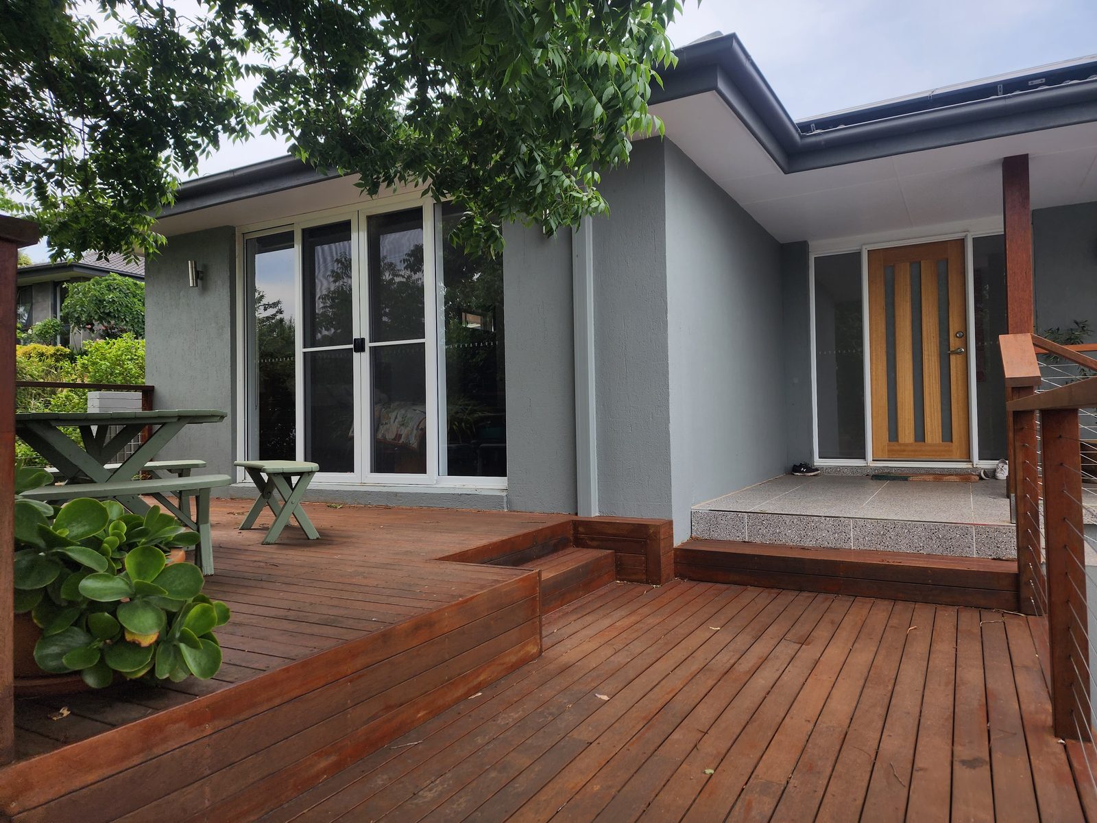 Timber deck with stairs and front landscaping