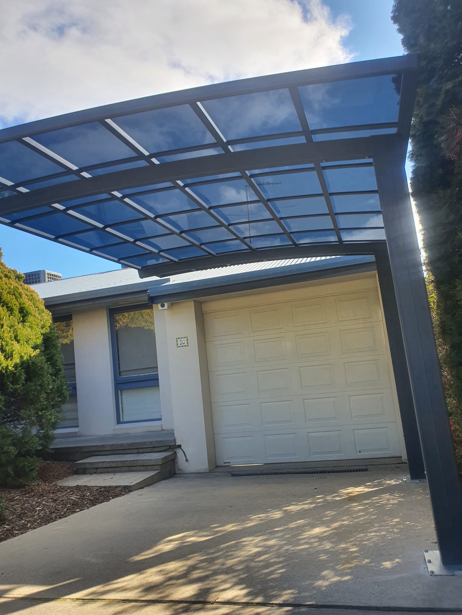 Polycarbonate carport installation