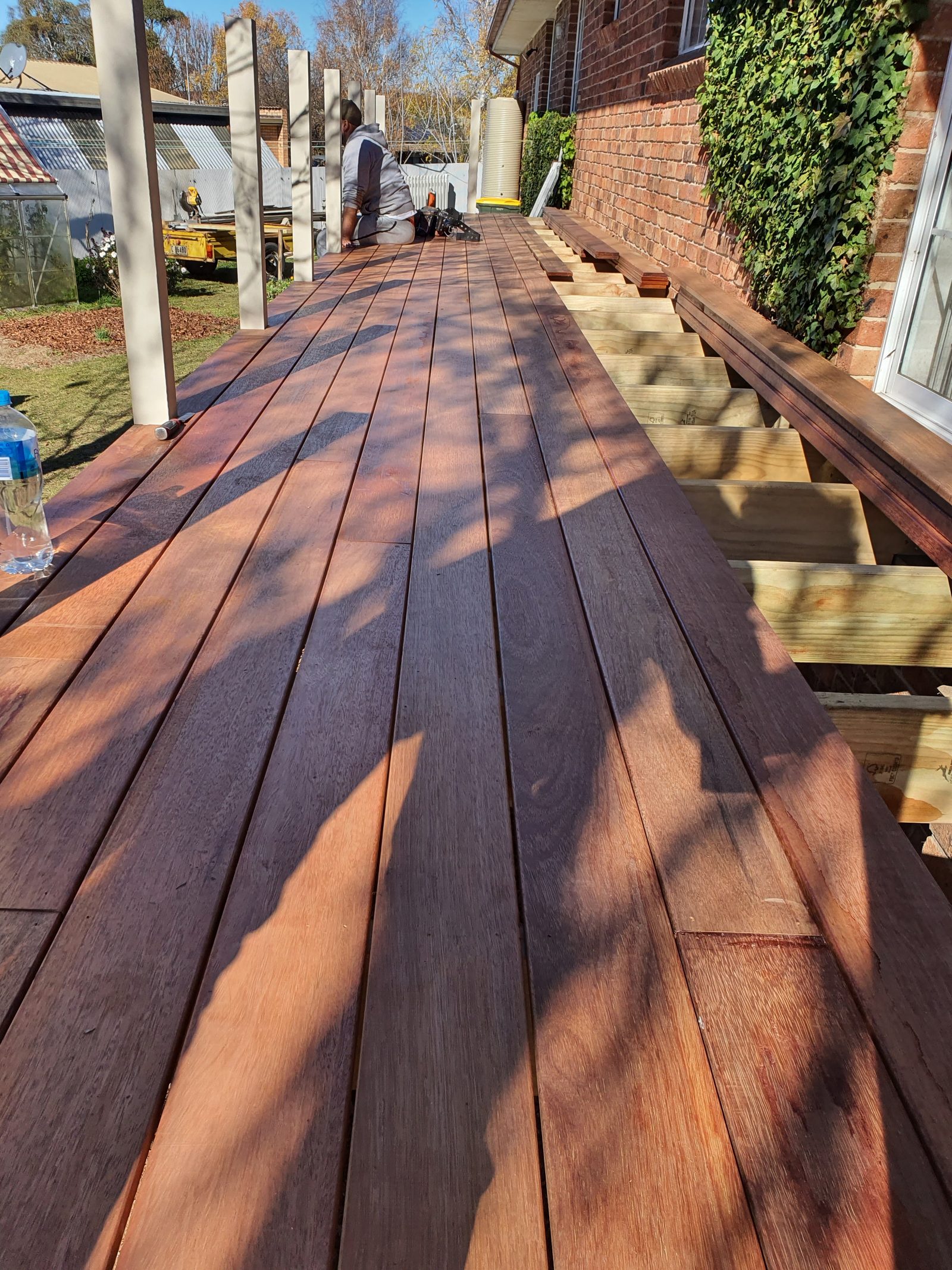Hardwood decking installation in progress